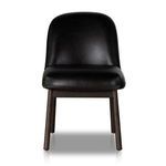 Front view of black leather armless dining chair showing padded seat and curved backrest