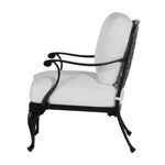 Repeat of side view highlighting curved armrests and padded backrest