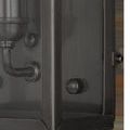 Close-up showing matte black brass frame corner and textured glass panel edge of Royster Outdoor Wall Sconce