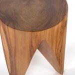 Back view showing narrow triangular legs and the end table’s natural teak color variation