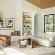 Alternate living space view with coffee table alongside modern armchair and sofa