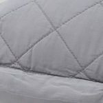 Close-up of diamond quilted texture and smooth bamboo sateen fabric details on Monaco coverlet