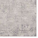 Close detail of floral pattern and distressed texture with thin border corner