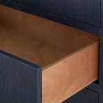 Open second drawer from top revealing veneered wood interior and drawer slides