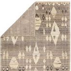 Back side of rug showing flat weave and muted gray striping detail