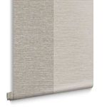 Close-up of Atelier Stripe Wallpaper roll showing alternating wider stripes and textured fabric effect in neutral shades