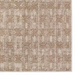 Top-down view focused on dense, distressed geometric arcs and lines in soft gold and beige tones