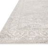 Low side angle highlighting the rug’s thickness and tightly woven border pattern