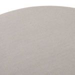 angled close-up of tabletop edge highlighting thickness and rounded corner