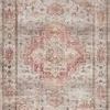 Vintage-style rectangular rug with faded spice red, beige, and taupe old-world medallion pattern