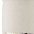 Close-up of light beige fabric drum lampshade with subtle texture