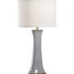 Table lamp with mottled gray glazed ceramic body, antique gold leafed wood base, brass parts, and white drum shade