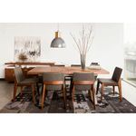 Dining room setup with four Deco Dining Chairs around rectangular wooden table and patterned rug.