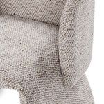 Close-up detailing inner curve where seat meets backrest with plush beige upholstery
