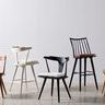 Group of various mid-century style dining chairs, including Ripley Chair in off-white finish