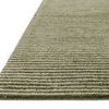 Side angle showing the rug’s thickness and pile texture of the Sunday Olive Ivory rug