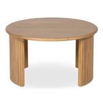 Central curved leg supports visible from front angle of round oak coffee table