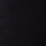 Close-up showing smooth deep charcoal twill fabric texture without pattern