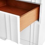 Open drawer with natural wood interior contrasting the white exterior of the Flanders side table
