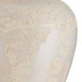 Close-up showing detailed textured ceramic surface of the lamp base with ivory and cream glaze