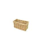 Small rectangular rattan basket viewed at a slight top-front angle, emphasizing compact size