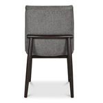 Rear view of Charlie dining chair focusing on dark wood legs and horizontal support detail