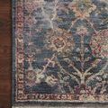 close-up corner view focusing on texture and intricate floral pattern on navy background
