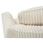 Close-up of loose back cushion and barrel back texture showing plush corduroy ribs