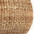 Extreme close-up of textured curls formed by natural rattan loops on chandelier