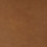 Close-up texture of smooth mahogany leather on the backrest