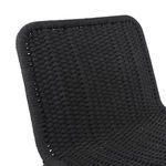Close-up view of the upper section of the chair backrest showing woven rope pattern