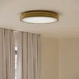 Flush mount installed on ceiling in room with beige walls and curtains