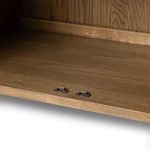 Sideboard with right side angled forward, emphasizing the rounded oak edges and tapered legs