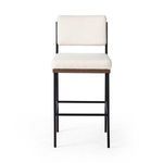 Benton Stool with slim black iron frame, oak seat decking, and white performance fabric seat and backrest