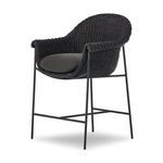 Front view highlighting curved woven backrest and dark padded seat cushion