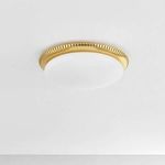Flush mount installed on white ceiling showing full top-down view