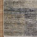 Rug corner with tight binding detail lying flat on a wood floor