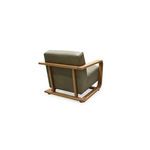 Back view of Eckersley Lounge Chair highlighting oak frame construction and leather upholstery seams