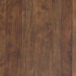 Close-up of tabletop surface emphasizing natural grain and variations in reclaimed wood