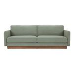 Vernon sofa in sage green fabric with wooden plinth base and removable cushions, mid-century modern style