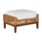 Rectangular outdoor ottoman with raffia woven sides, wooden legs, and a thick white cushion on top