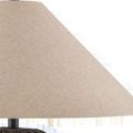 Close-up of beige fabric conical lampshade showing woven textile texture