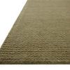 Close-up angled view of Kai Olive Rug showing thick ribbed pile texture and olive color depth