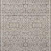 Vintage style area rug in beige and grey with intricate timeless motifs and a distressed look