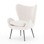 Lainey Chair Knoll Natural with curved silhouette, natural linen upholstery, tufted seat cushion, and slender black metal ...