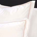 Soft pink Sheena Bamboo Sateen Euro Sham with subtle piping detail on crisp fabric