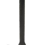 Close-up of textured black wrought iron lamp pole and base connecting seamlessly