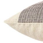 Close-up angled view showing textured woven fabric in natural beige and gray with detailed stitching