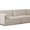 Angled view of Toland sectional armrest with cylinder cushion and smooth upholstered base