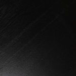 Close-up of black wood tabletop texture with visible wood grain